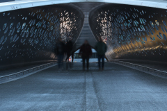 Candid street photography focusing on human interaction and quiet observation