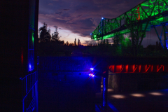 Street photography focused on everyday life in Landschaftpark by night, stillness, and subtle human interaction.