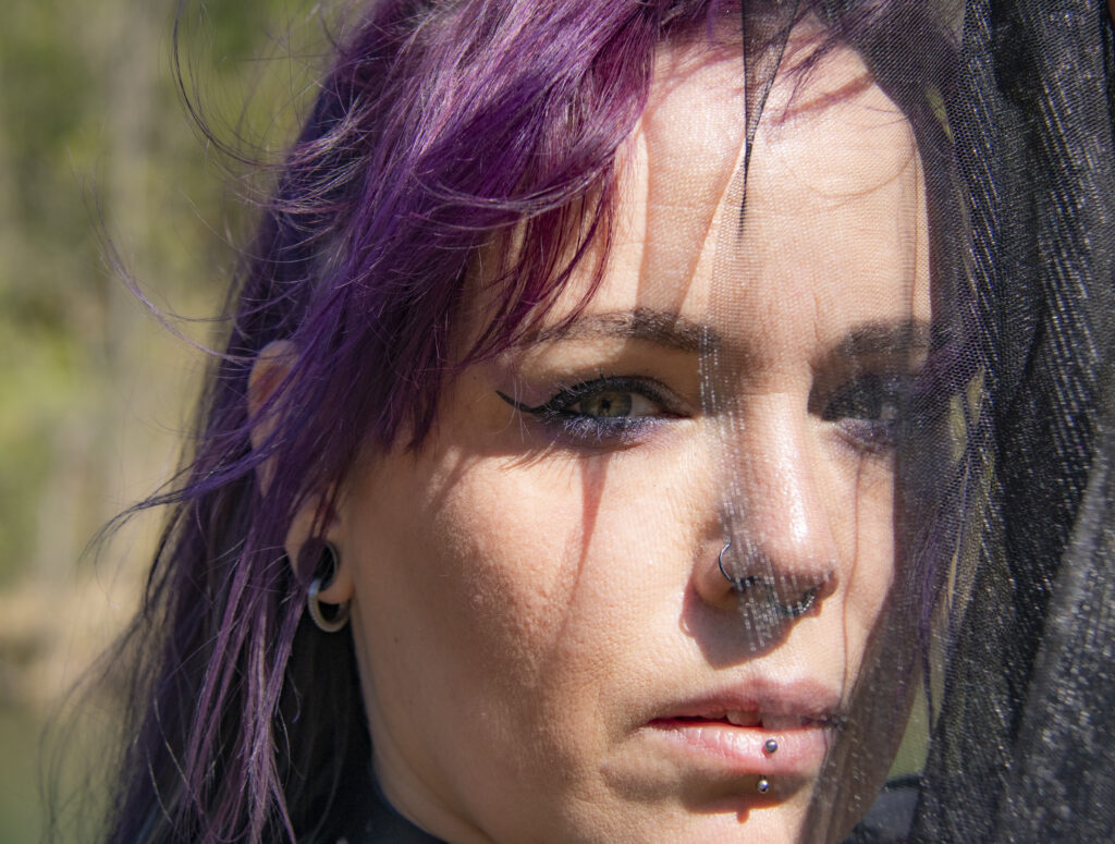 Fine art portrait in natural light focused on emotion and stillness